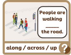 Shows people crossing the road.